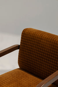 
                  
                    Lulu Armchair in premium fabric with modern design, perfect for stylish living room seating.
                  
                